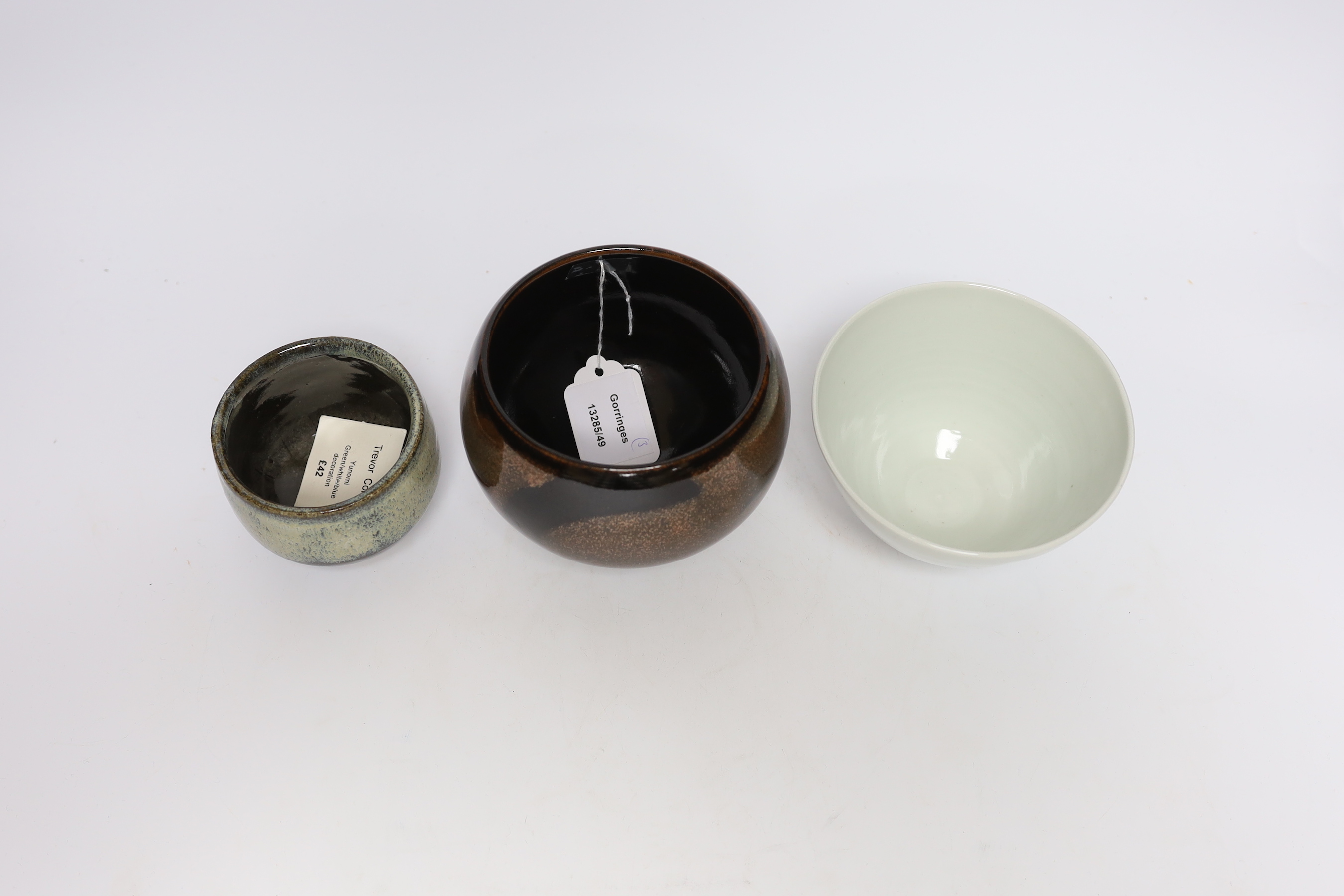 Three Studio pottery bowls, including one by Trevor Corser, tallest 10.5cm